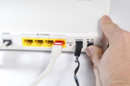 khoi dong lai router